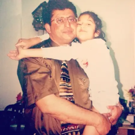 childhood picture of natasha assadi with her father
