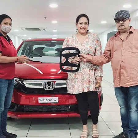 Aparajita Adhya and Atanu Hazra with their new car