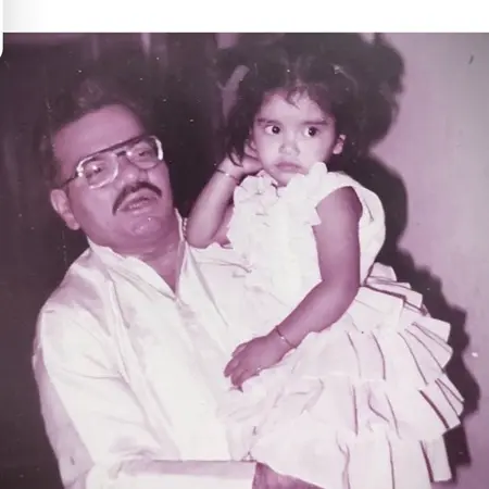 Childhood picture of Koena Mitra with her father